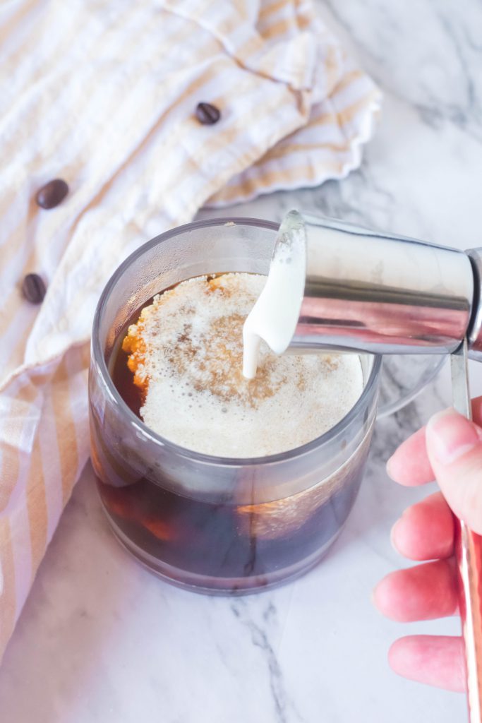 pouring cream in mug